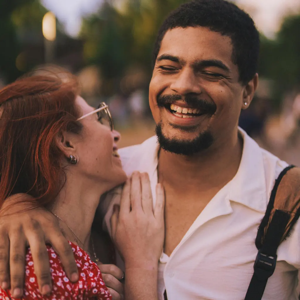 Happy couple laughing together